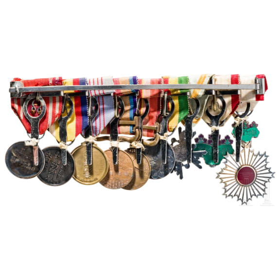 A large medal bar with 9 decorations