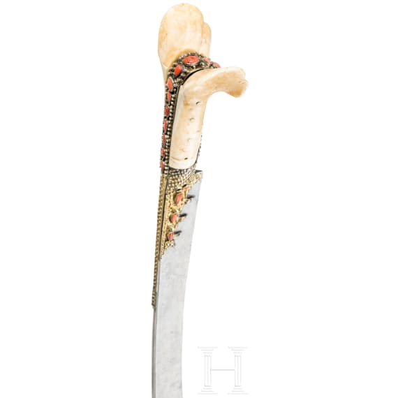 An Ottoman yatagan with wootz blade set with corals, circa 1820