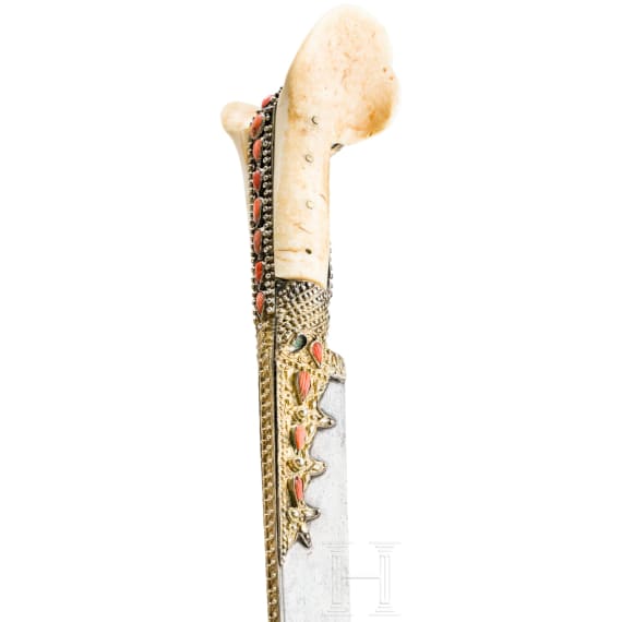 An Ottoman yatagan with wootz blade set with corals, circa 1820