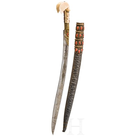 An Ottoman silver-mounted yatagan, set with corals, circa 1840