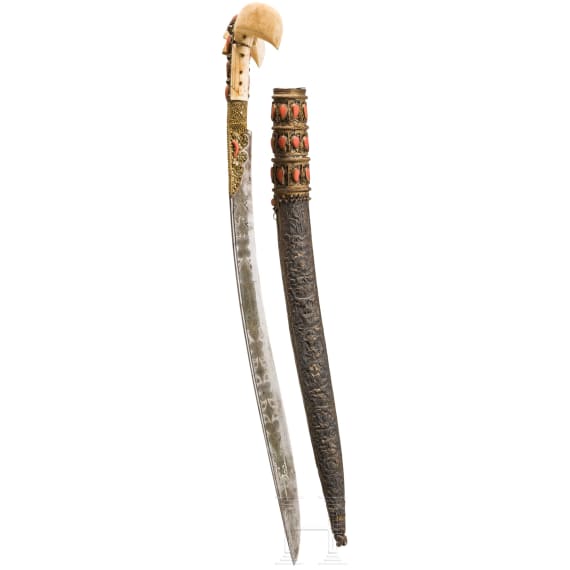 An Ottoman silver-mounted yatagan, set with corals, circa 1840