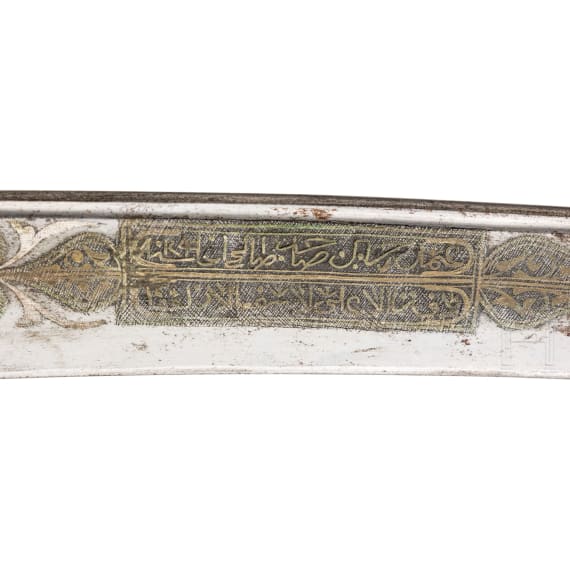 An Ottoman silver-mounted yatagan, set with corals, circa 1840