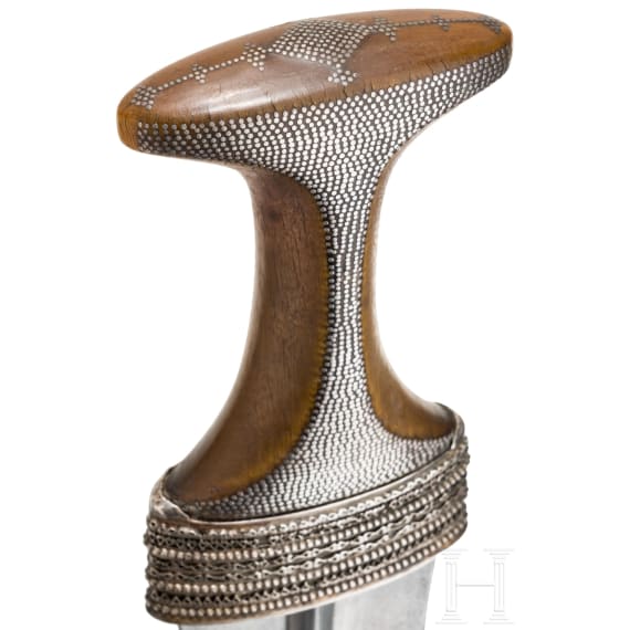 A silver-mounted djambya with rhinoceros horn hilt, Arab Peninsula, circa 1900