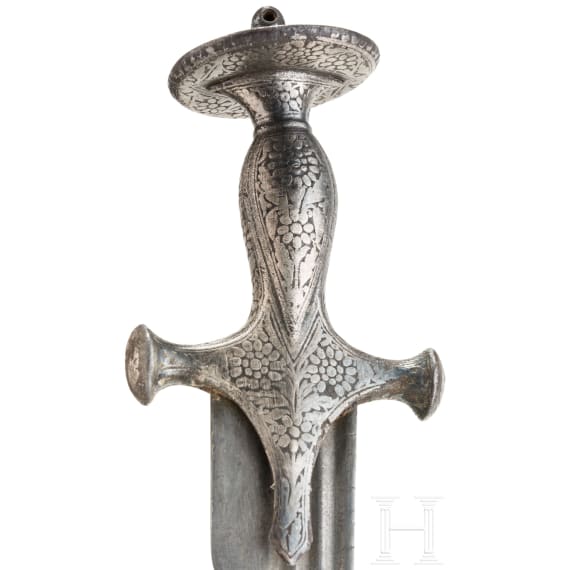 An Indian Tulwar with silver damscened hit and damascus blade, ca. 1800