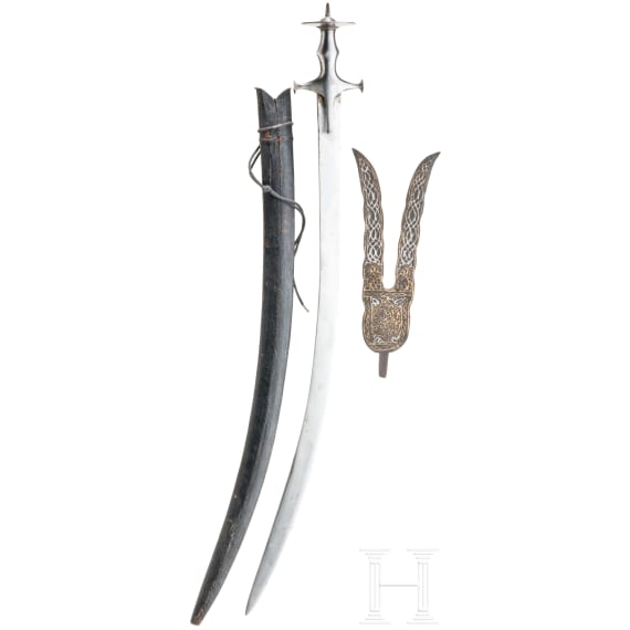 An Indian Tulwar and a forked lance head, 19th century