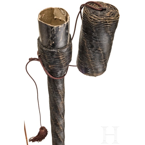 A Japanese Yazutsu holding four target arrows, Meiji period