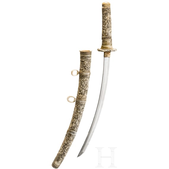 A carved ivory-mounted Wakizashi, late Edo period