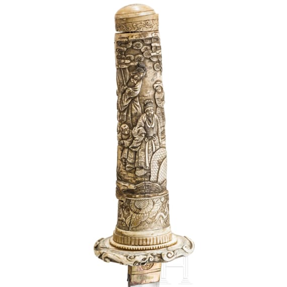A carved ivory-mounted Wakizashi, late Edo period