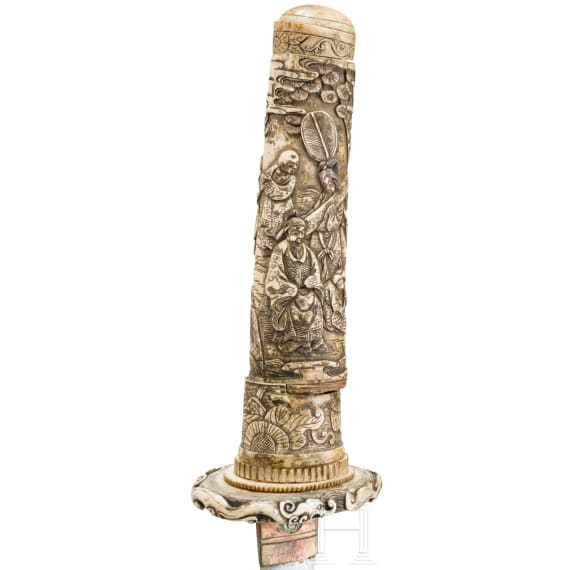 A carved ivory-mounted Wakizashi, late Edo period