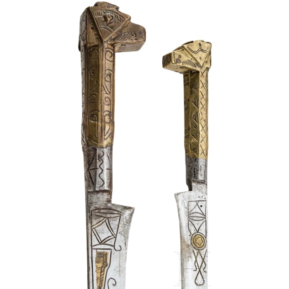 A Algerian brass-inlaid flyssa and a dagger, 19th century