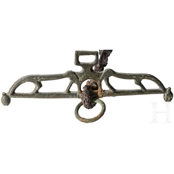 A snaffle and a spur, 1st/2nd and 9th/10th century