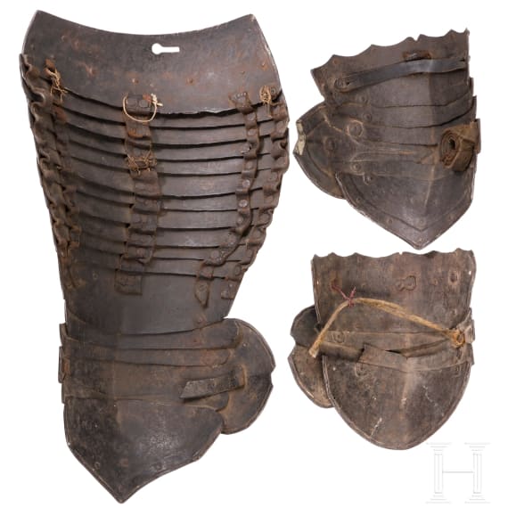 A right cuisse and two knee buckles for Flemish cuirassier's armour, ca. 1620