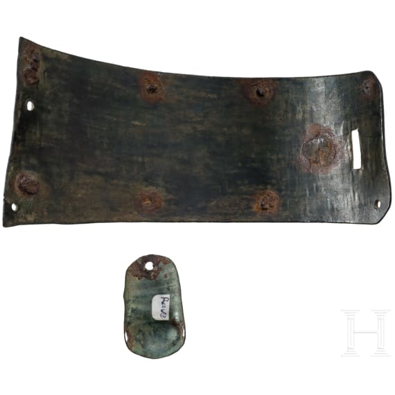 Two German bronze armour fragments, 14th century