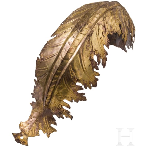 A fire gilt mount of a Venetian parade barbuta, 17th/18th century