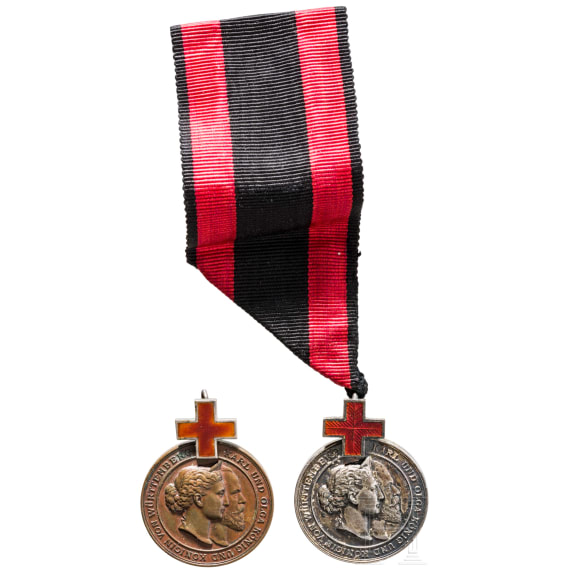 Zwei Karl-Olga-Medaillen