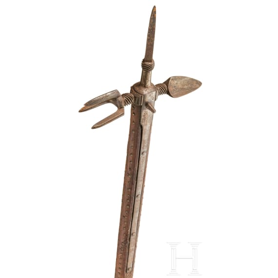 A collector's replica of a war hammer in the style of the 15th century