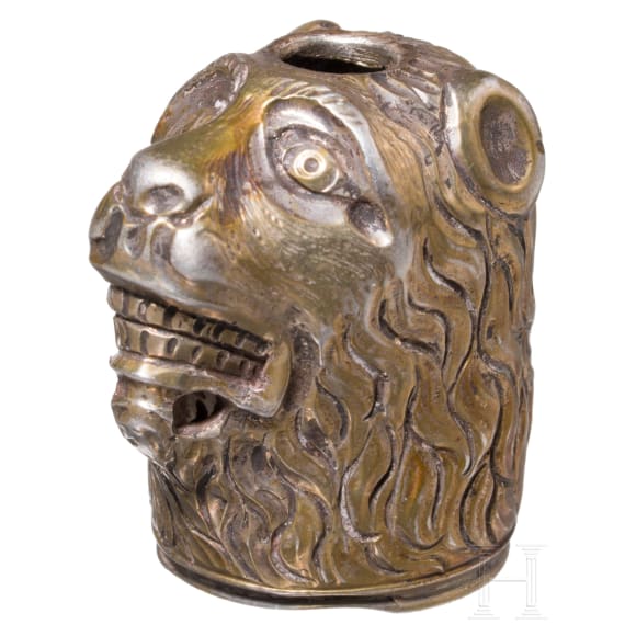 A German lion's head pommel made of gild silver, 2nd half of the 17th century