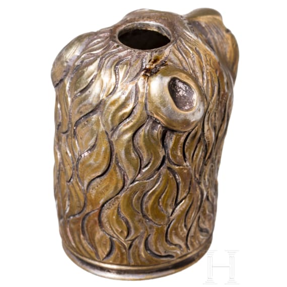 A German lion's head pommel made of gild silver, 2nd half of the 17th century