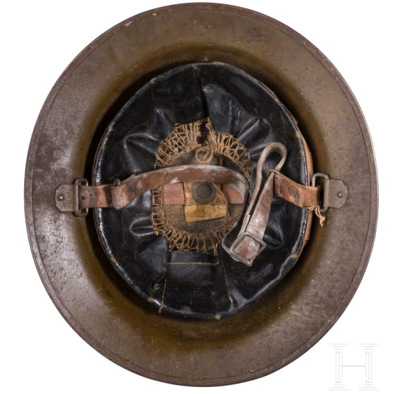 A steel helmet M 17 "Brodie" of a veteran from the 2nd Infantry Division "Indianhead"