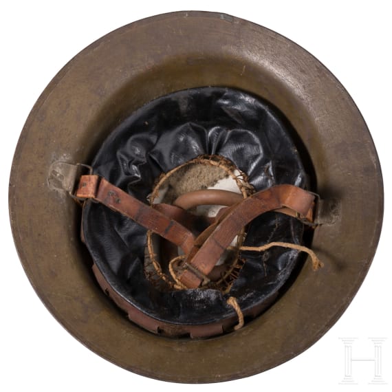 A steel helmet M 17 "Brodie" of a veteran of the77th Infantry Division