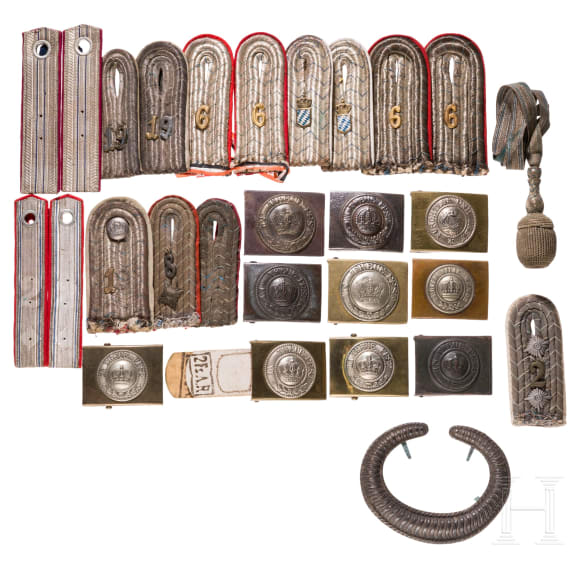 Six belt buckles and cloth insignia