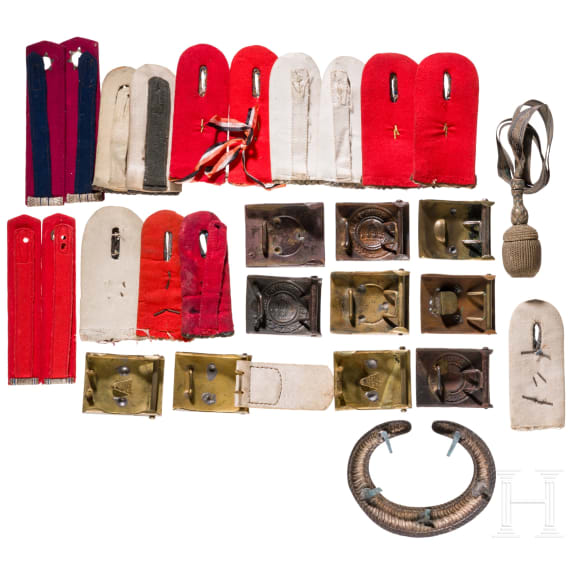 Six belt buckles and cloth insignia