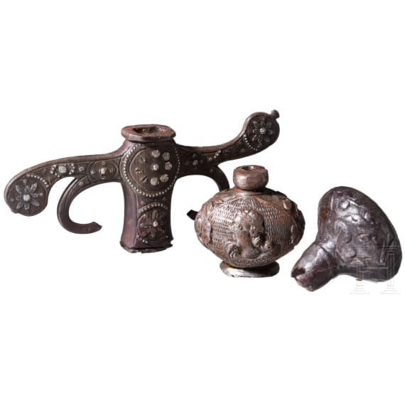 Two German/Italian iron pommels and a guard, 17th/18th century