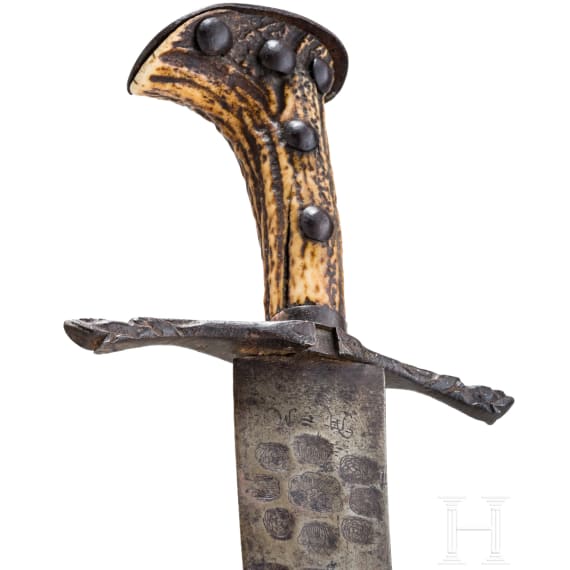 A German hunting sabre with fine etched blade, circa 1660