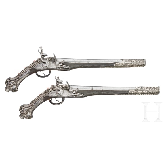 A pair of silver-mounted Balkan Turkish flintlock pistols, circa 1830