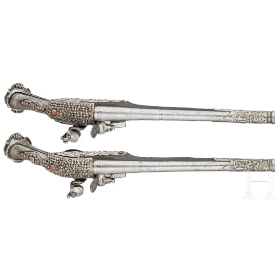 A pair of silver-mounted Balkan Turkish flintlock pistols, circa 1830