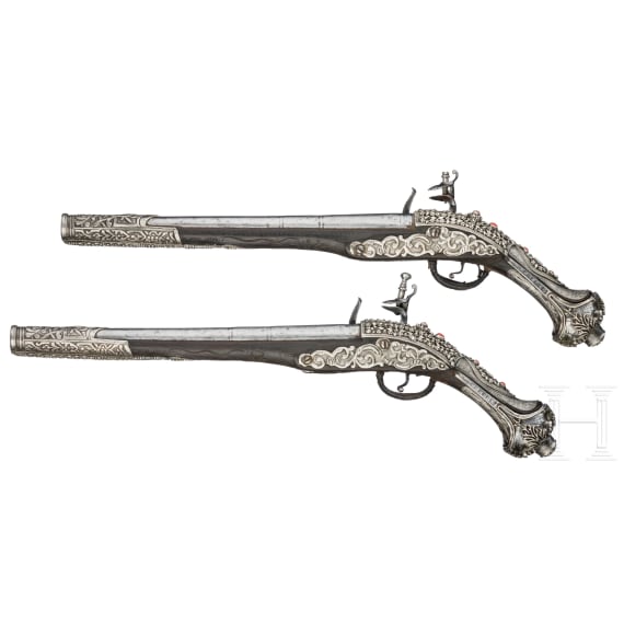 A pair of silver-mounted Balkan Turkish flintlock pistols, circa 1830