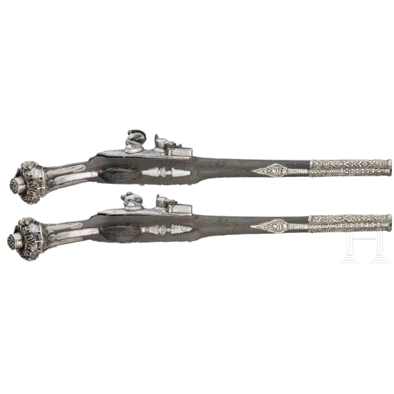 A pair of silver-mounted Balkan Turkish flintlock pistols, circa 1830