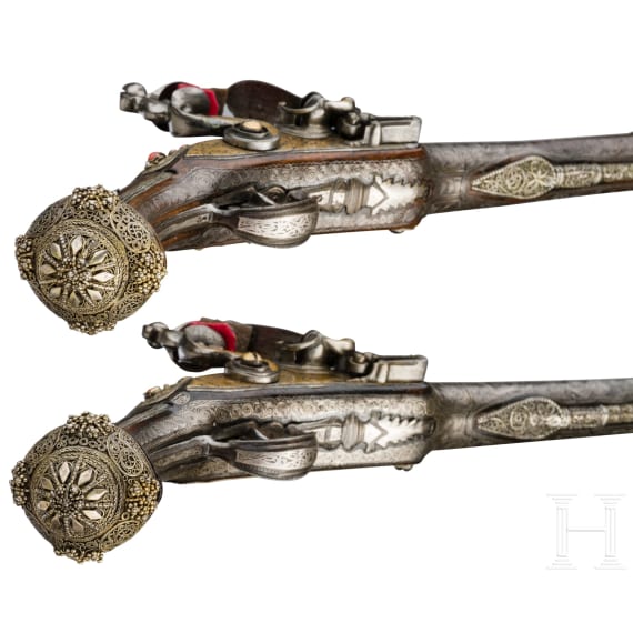A fine pair of Ottoman silver-mounted flintlock pistols, dated 1849