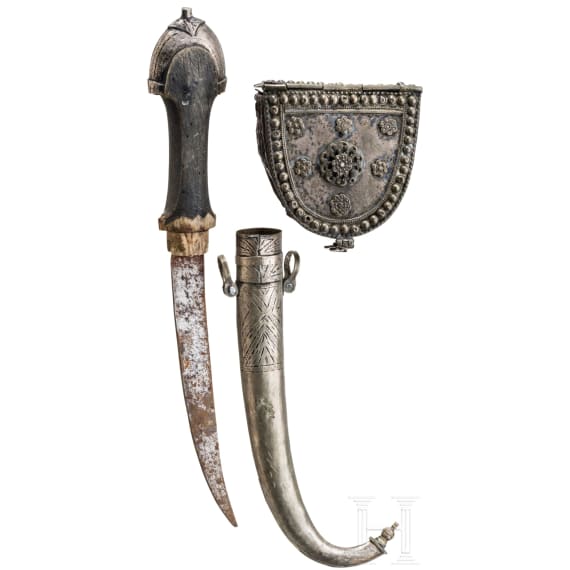 A yemenite matchlock rifle with cartridge pouch and Khoumya, 19th and 20th century