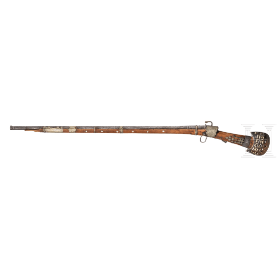 A yemenite matchlock rifle with cartridge pouch and Khoumya, 19th and 20th century