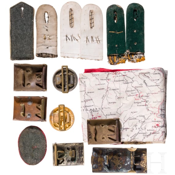 Six belt buckles and cloth insignia