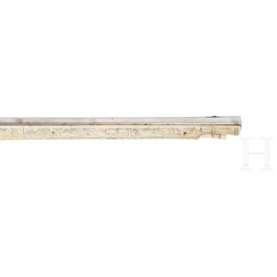 A wheellock hunting rifle with richly engraved, presumably later ivory-veneered stock, Wilhelm Neubauer of Prague, circa 1690/95