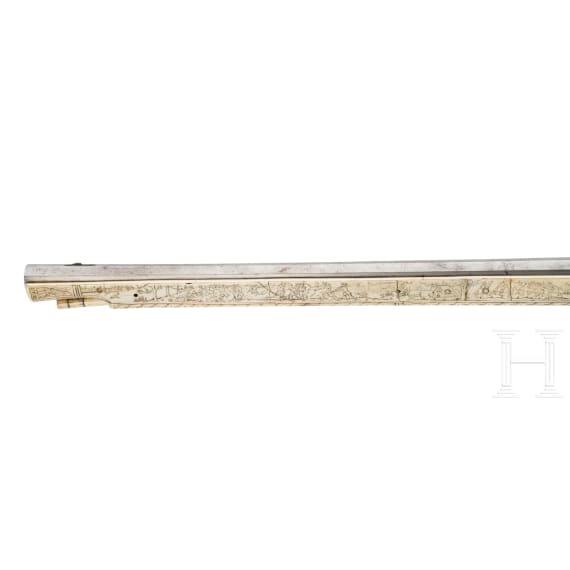 A wheellock hunting rifle with richly engraved, presumably later ivory-veneered stock, Wilhelm Neubauer of Prague, circa 1690/95