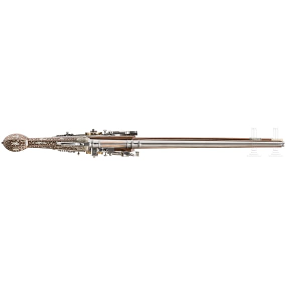 A long, double-barreled wheellock pistol, a modern collector's reproduction in the style of 1610