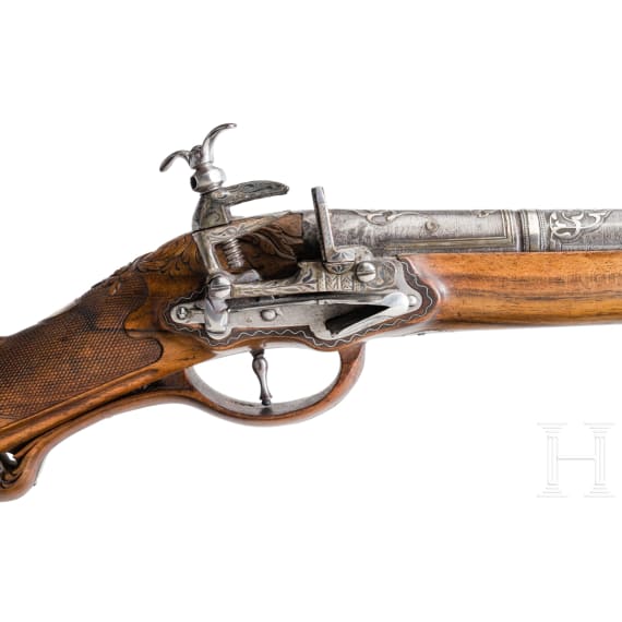 A fine silver-mounted Miquelet rifle with an Ottoman barrel, ca. 1760