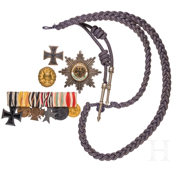 A visor cap for officers of the Jaeger battalions and some medals