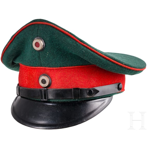 A visor cap for officers of the Jaeger battalions and some medals