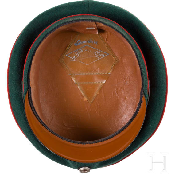 A visor cap for officers of the Jaeger battalions and some medals
