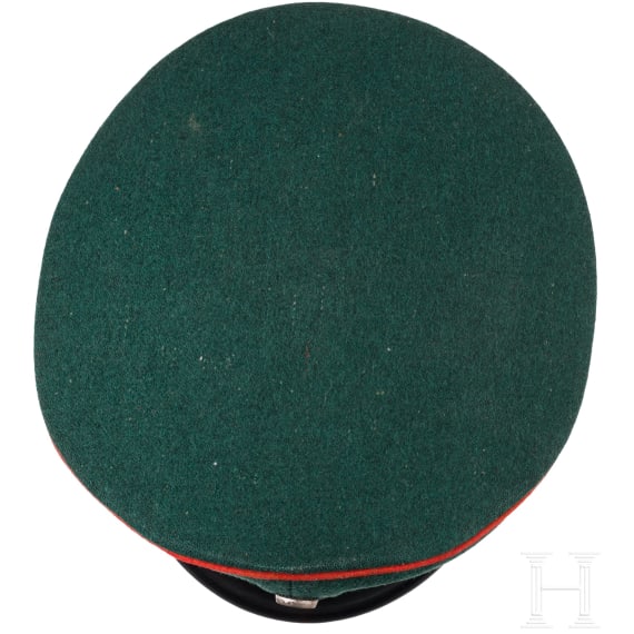 A visor cap for officers of the Jaeger battalions and some medals