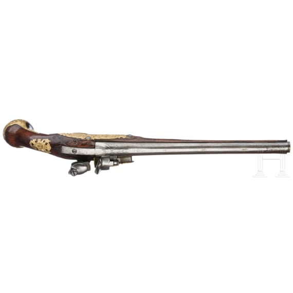 A flintlock pistol with fire-gilt mounts, circa 1720