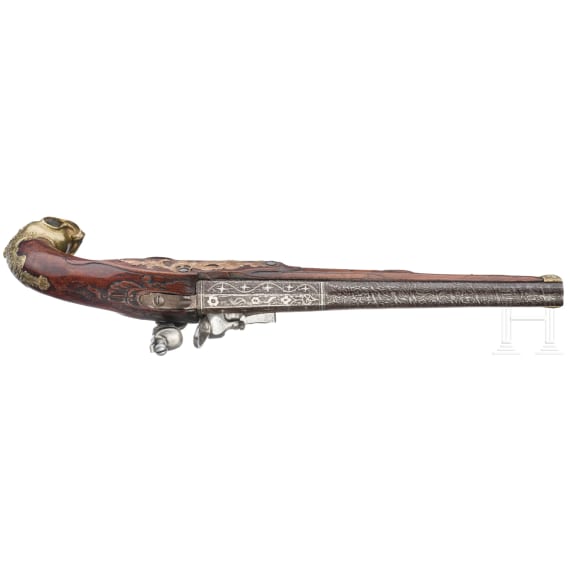 A fine Carlsbad flintlock pistol with bird's head stock, circa 1760