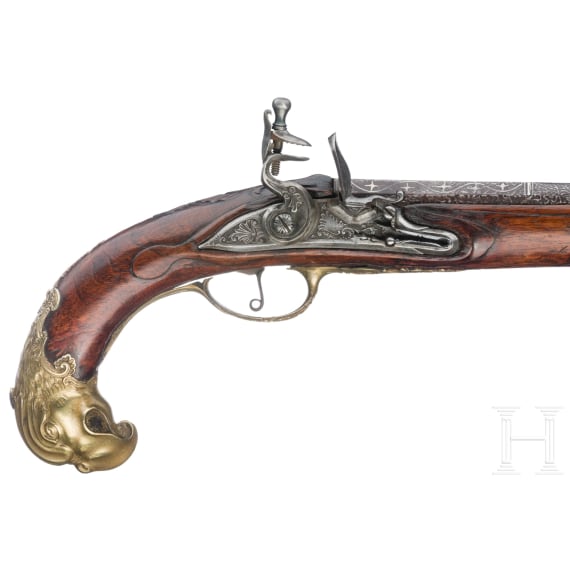A fine Carlsbad flintlock pistol with bird's head stock, circa 1760