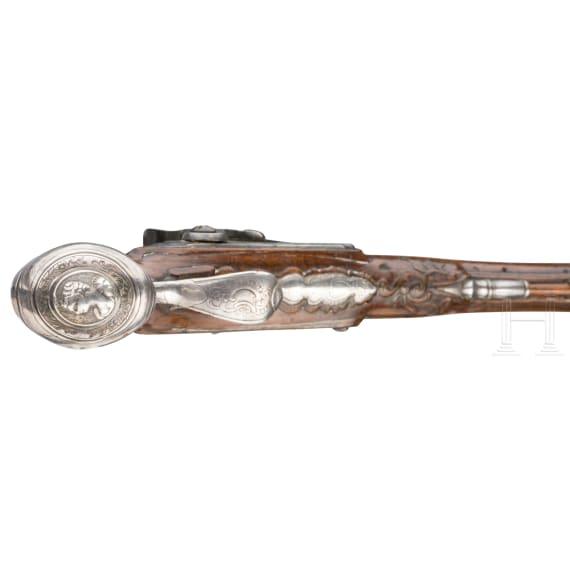 A pair of silver mounted percussion pistols, Antoine Gillier in St. &Eacute;tienne, circa 1790