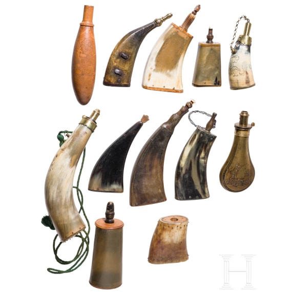 A set of twelve powder flasks, 18th/19th century.