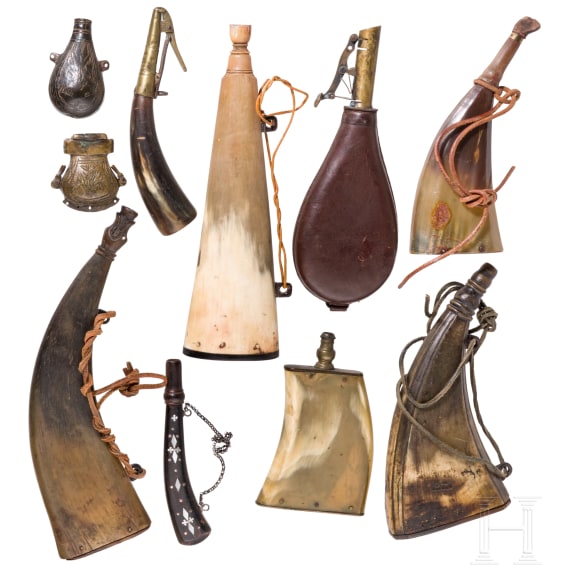Set of seven powder flasks with accessories, 19th century